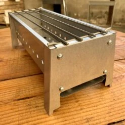 Spiedini Saté-bbq Bali 40 Mini - Kleine, Smalle Houtskoolbarbecue Met Horizontaal Rooster Voor Sate Of Andere Spiesjes - 40 Cm Lang, 11 Cm Breed, 14 Cm Hoog - Ideaal Voor Tuin- Of Open Haard, Of Balkon - Materiaal: Gealuminiseerd Ijzer -Keuken Accessoires Verkoop 1200x1200 997